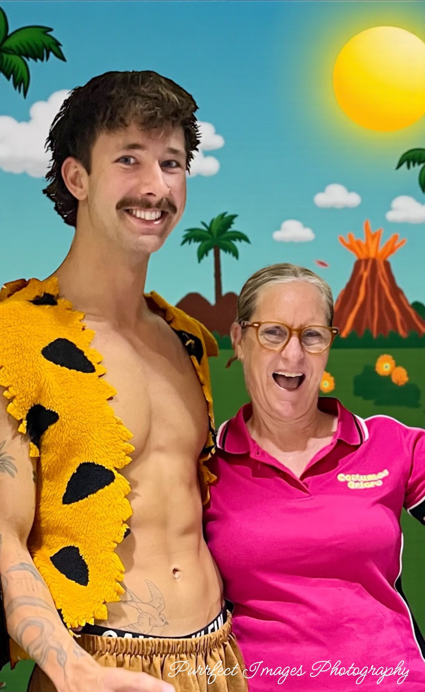 Man and Woman Smiling in Front of a Colorful Cartoon Backdrop — Costumes Galore in Fraser Coast, QLD