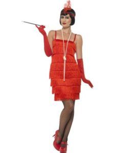 Woman in Red Flapper Dress, Holding Cigarette Holder, With Headband and Long Gloves — Costumes Galore in Maroochydore, QLD
