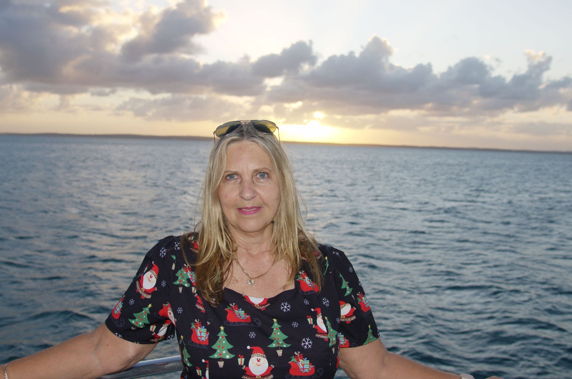Dog Sits on a Cream-colored Chair — Costumes Galore In Maroochydore, QLD