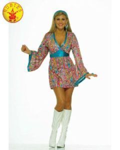Woman in a Paisley Print, 70s Style Dress and White Boots, Wearing a Blue Headband — Costumes Galore in Maroochydore, QLD