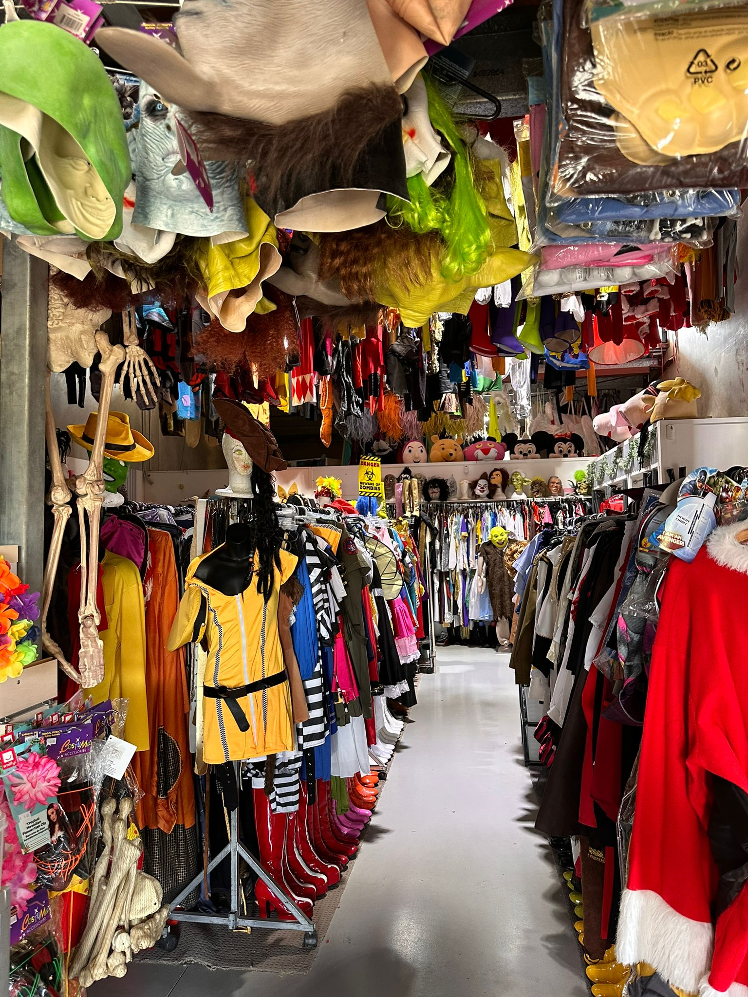 A Vibrant Costume Shop With Rows of Colourful Outfits on Racks — Costumes Galore In Maroochydore, QLD