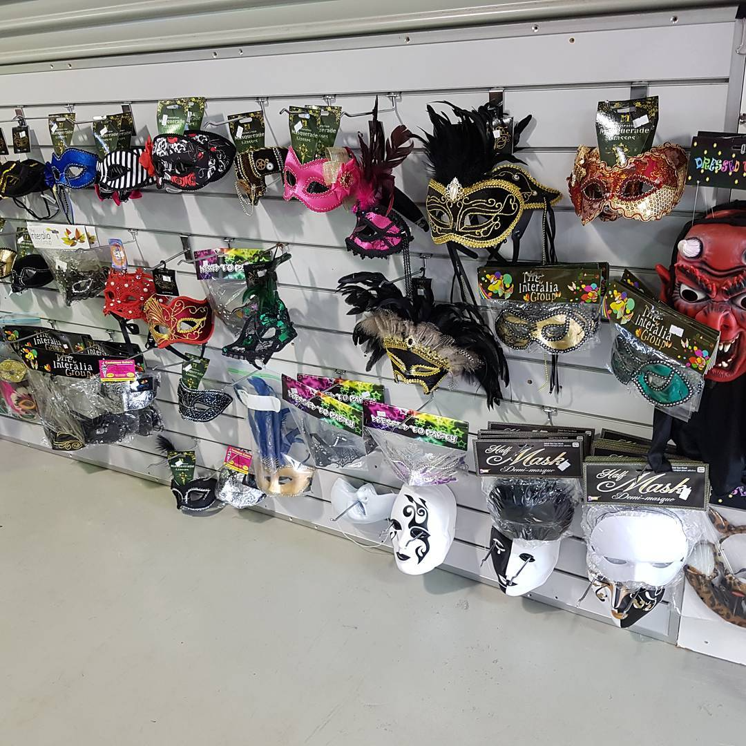 A Display of Colourful Masquerade Masks Hangs on a Store Wall — Costumes Galore In Maroochydore, QLD