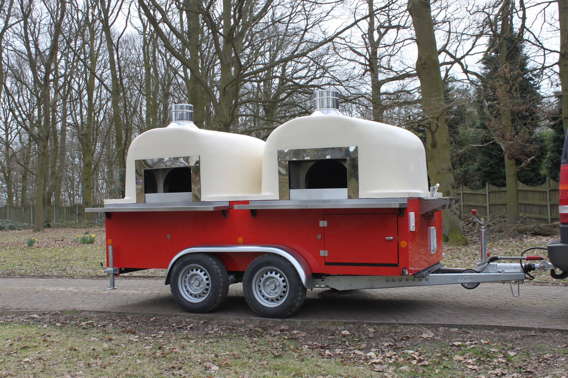 twin axle wood fired pizza trailer with double ovens