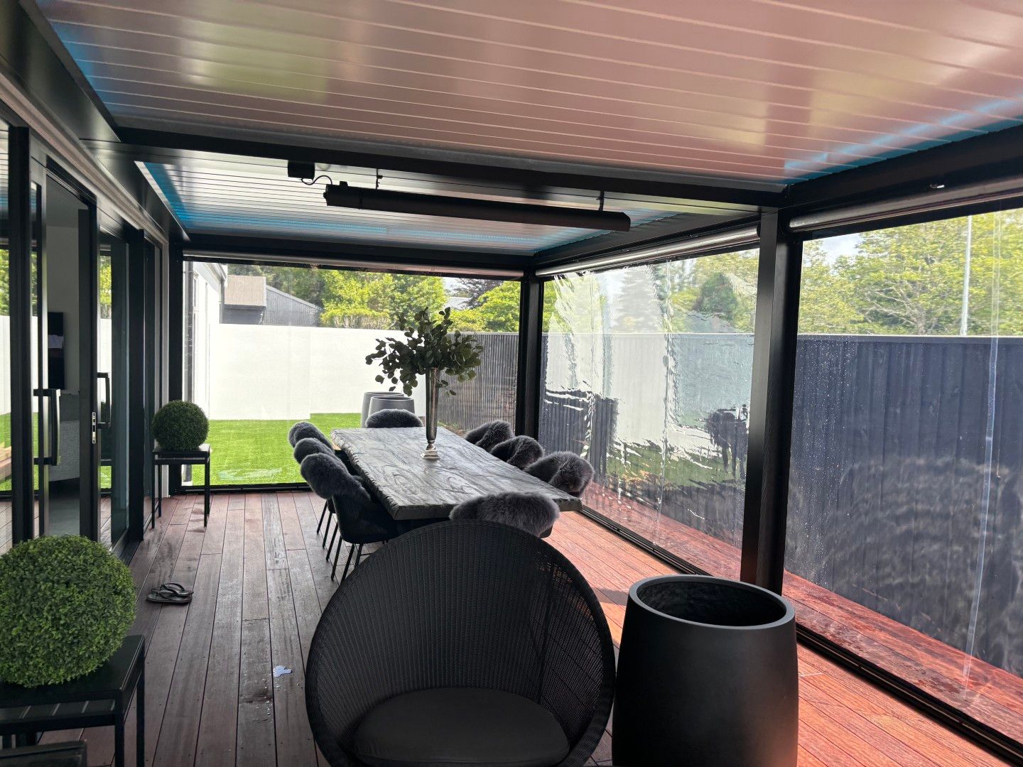 There is a large table and chairs in the room.