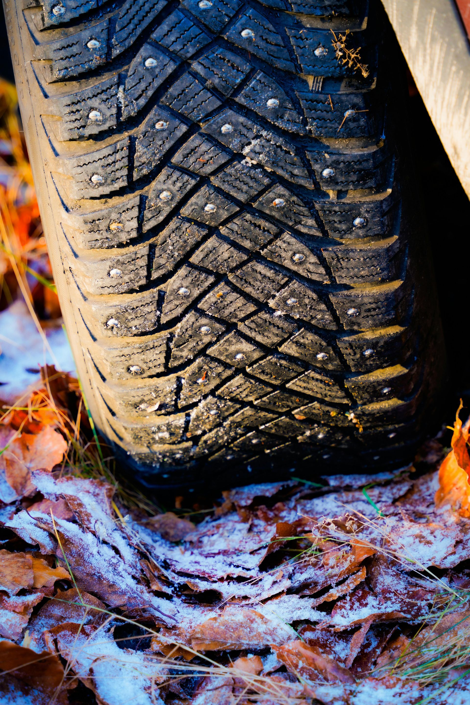 tire with studs for winter weather riving