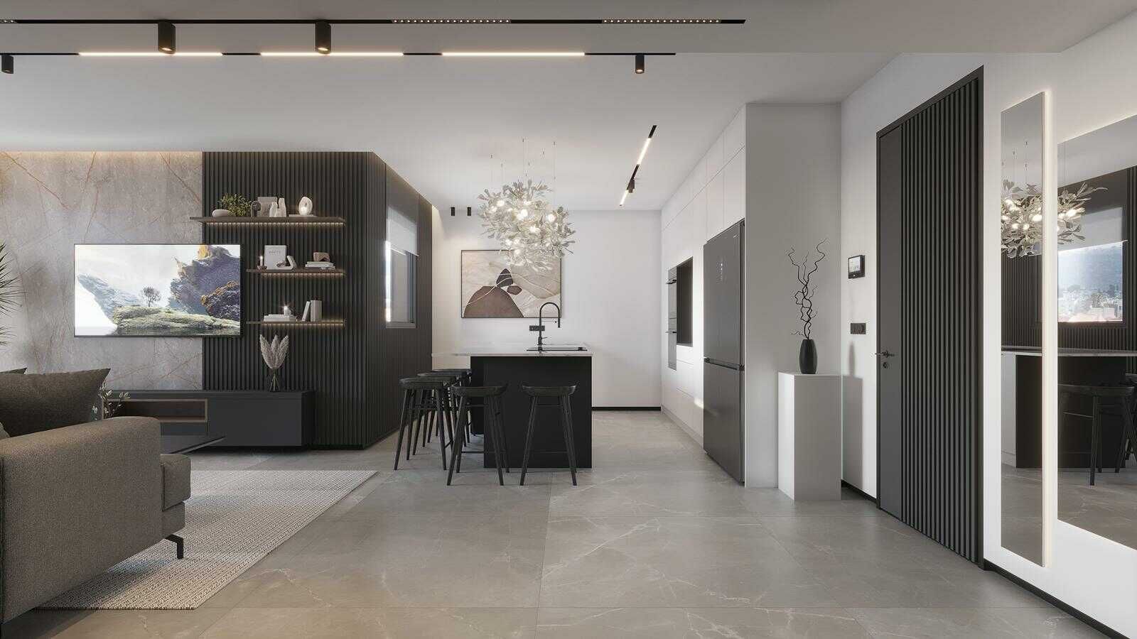 מטבח יוקרתי מודרני בדירת 5 חדרים בראשון לציון, עם אי שיש שחור-לבן, כיור מעוצב, בר ישיבה, ופתרונות אחסון אינטגרליים למטבח פרקטי