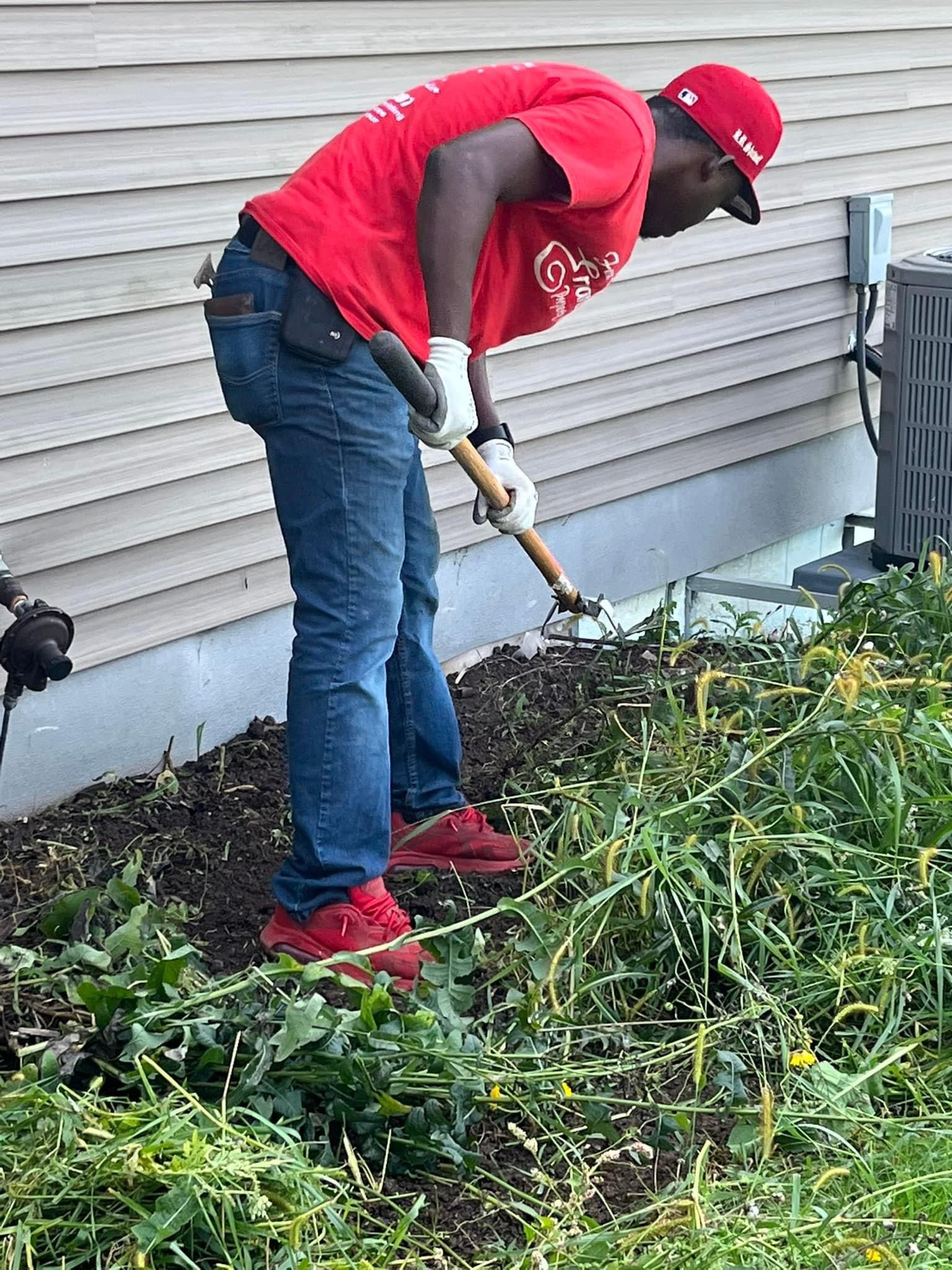 A Man is Digging in the Dirt – Appleton, WI - Errands & Property Maintenance 