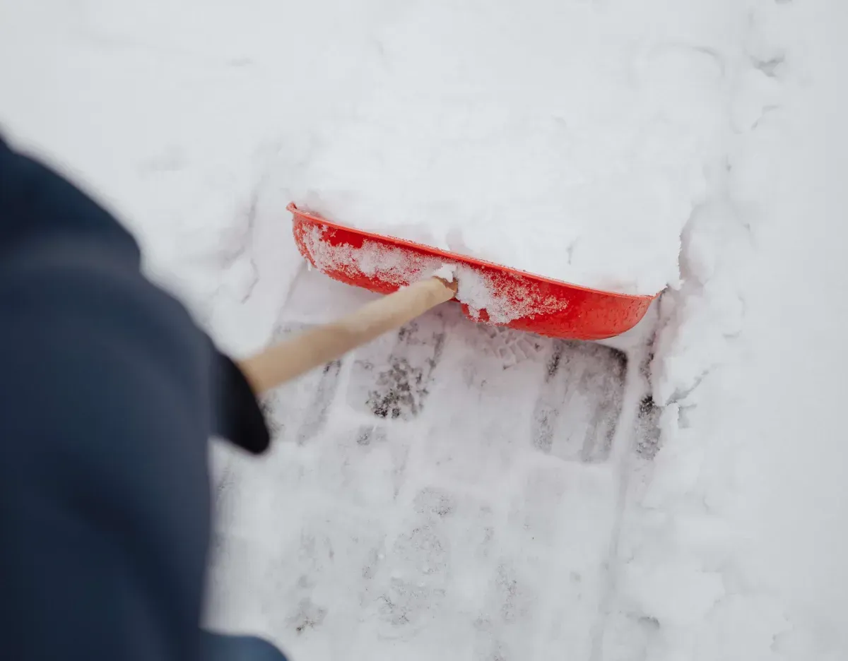 A Person is Shoveling Snow – Appleton, WI - Errands & Property Maintenance 