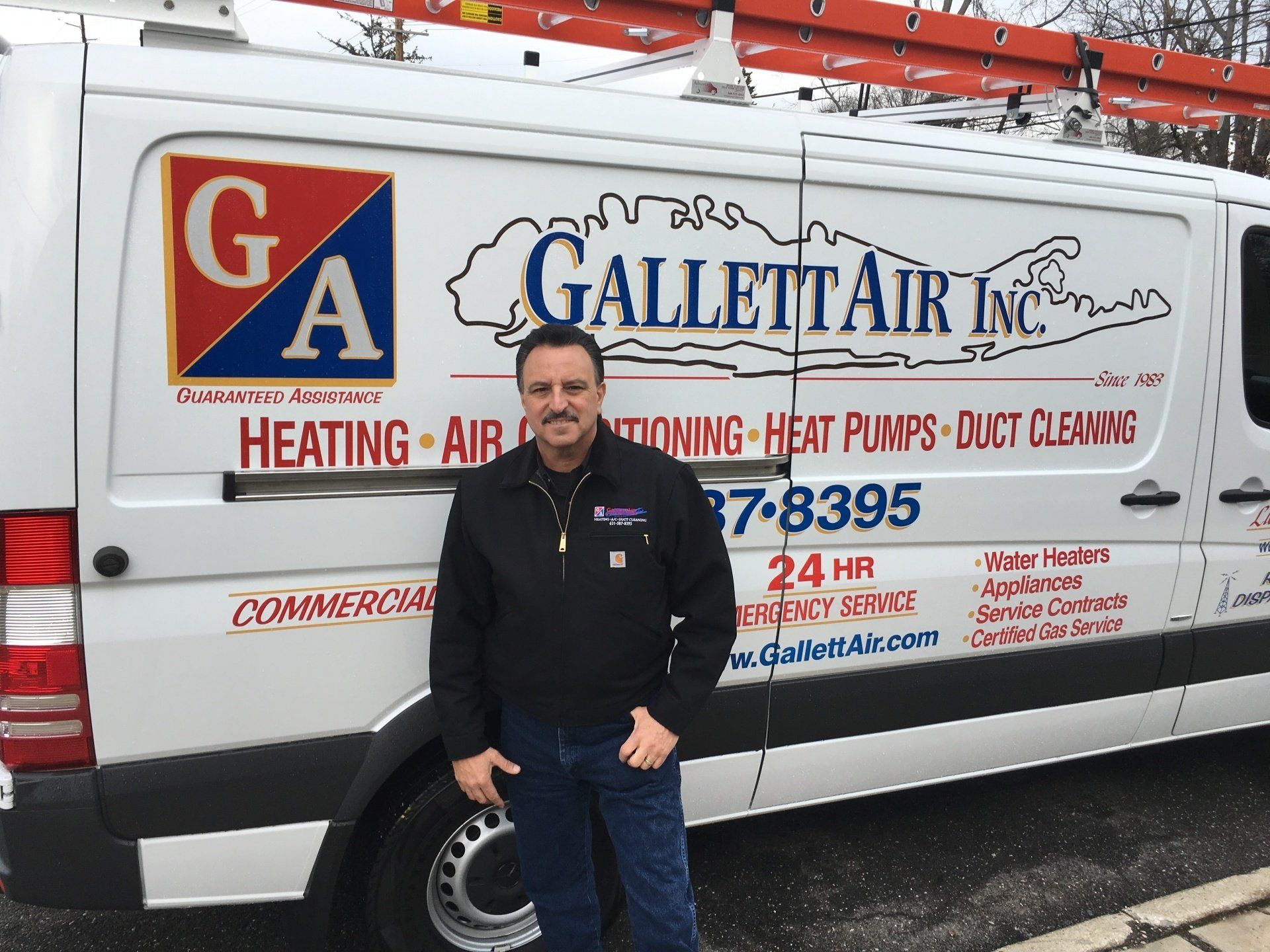 contractor in front of work van