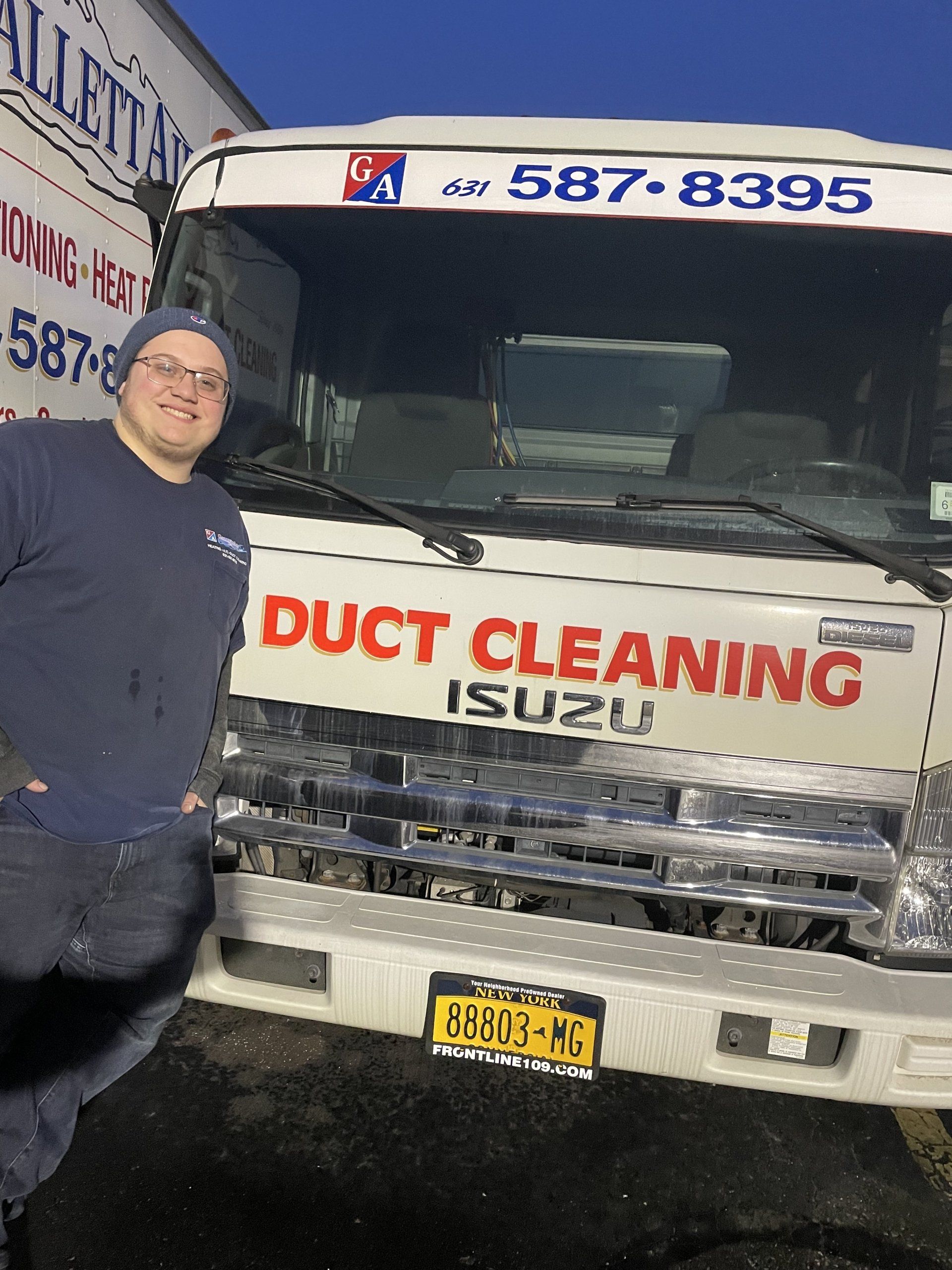 contractor in front of work van