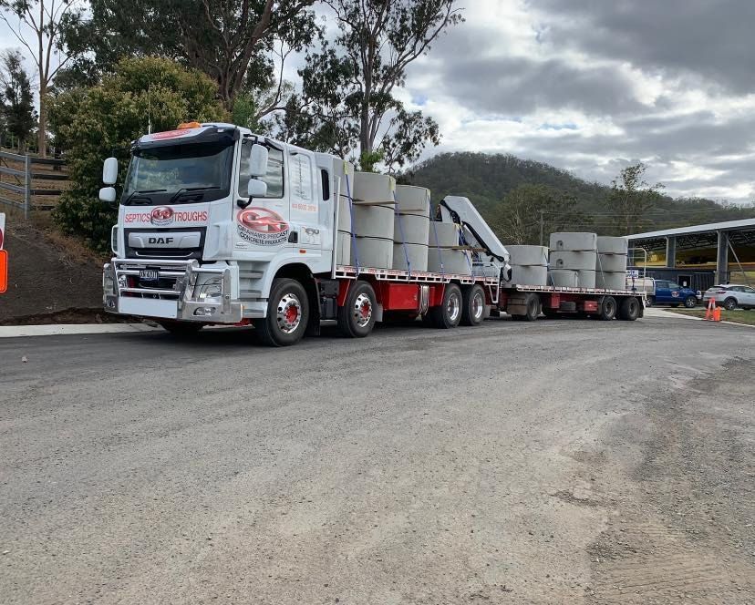 A Large Truck is Parked on the Side of the Road — Graham's Precast Concrete Products Pty Ltd in Kyogle, NSW