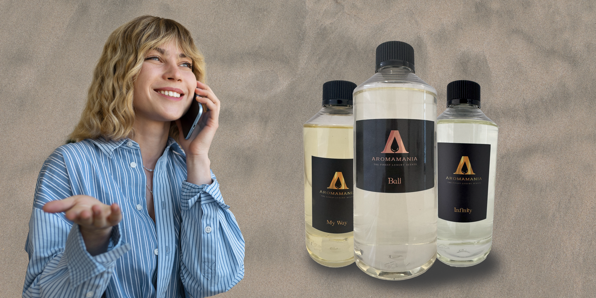A woman is talking on a cell phone next to three bottles of water.