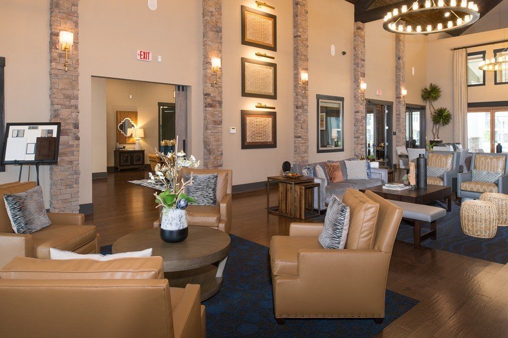 A living room filled with furniture and a chandelier