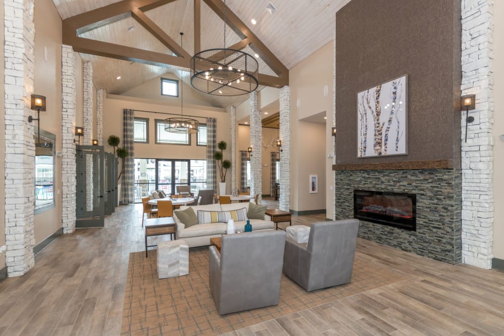 A living room filled with furniture and a fireplace.