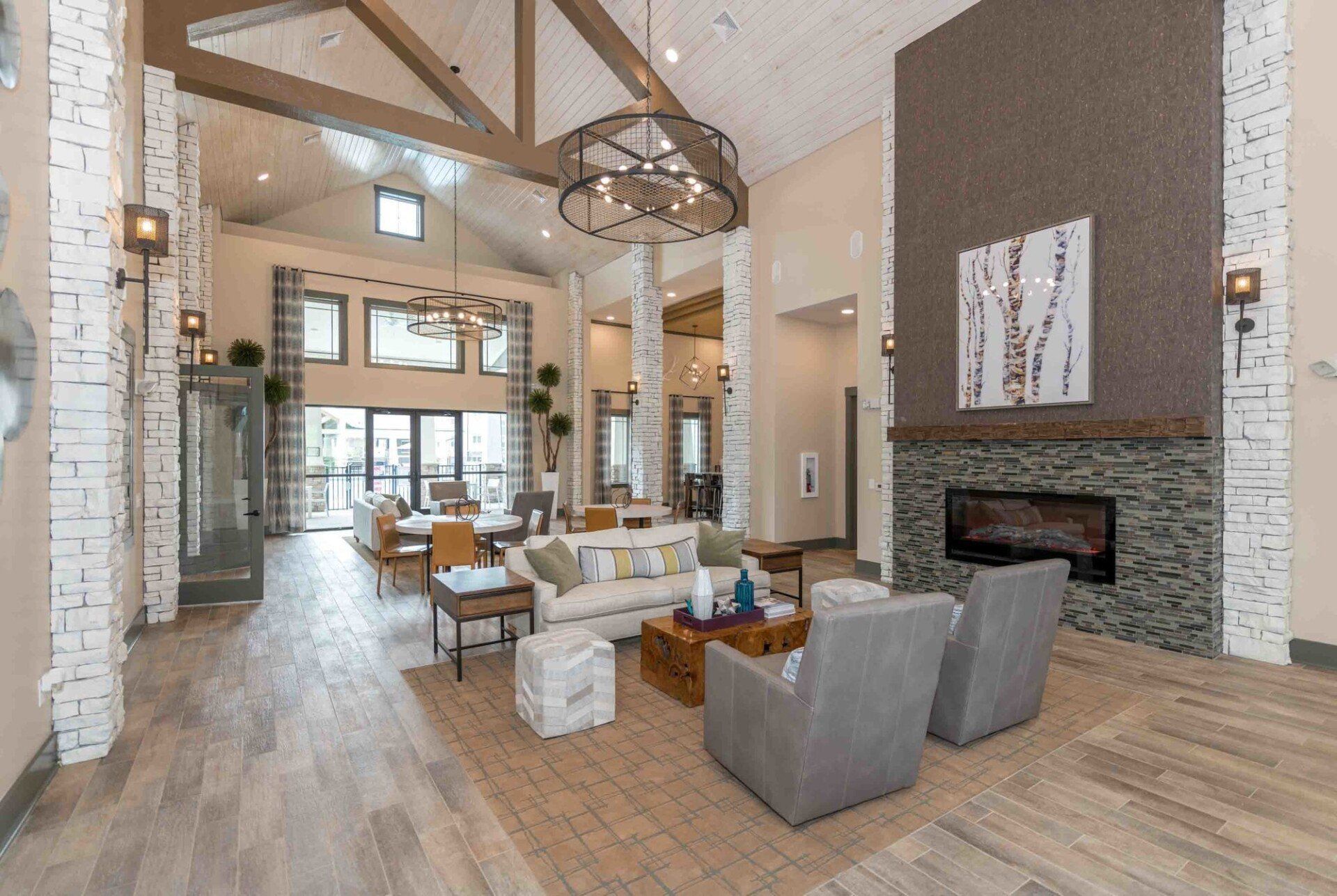 A living room filled with furniture and a fireplace.