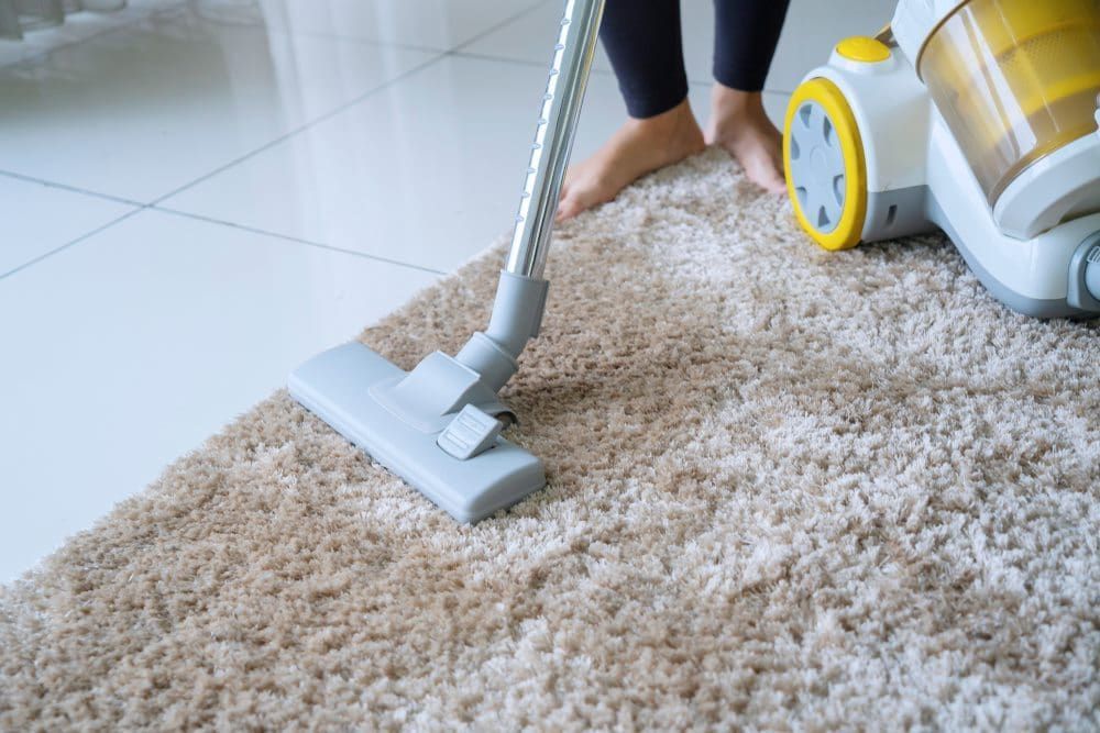 Woman Using A Vacuum Cleaner — 2easy Cleaning in Bendigo, VIC