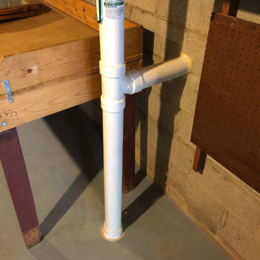 system venting a basement and an adjacent slab foundation