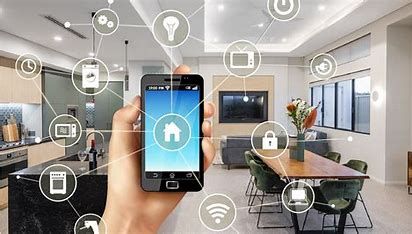 White kitchen with marble countertop, hexagon tile backsplash. Two colorful pots on countertop, under white cabinets.