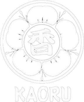 Circular floral emblem with a face and the name “KAORU” below.