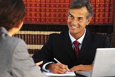 Lawyer — Lawyer Smiling on Client in Temple, TX