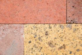 Multi coloured concrete walkway garden in a residential property in Bendigo VIC.