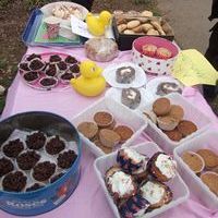 There are many different types of food on the table for fundraiser.