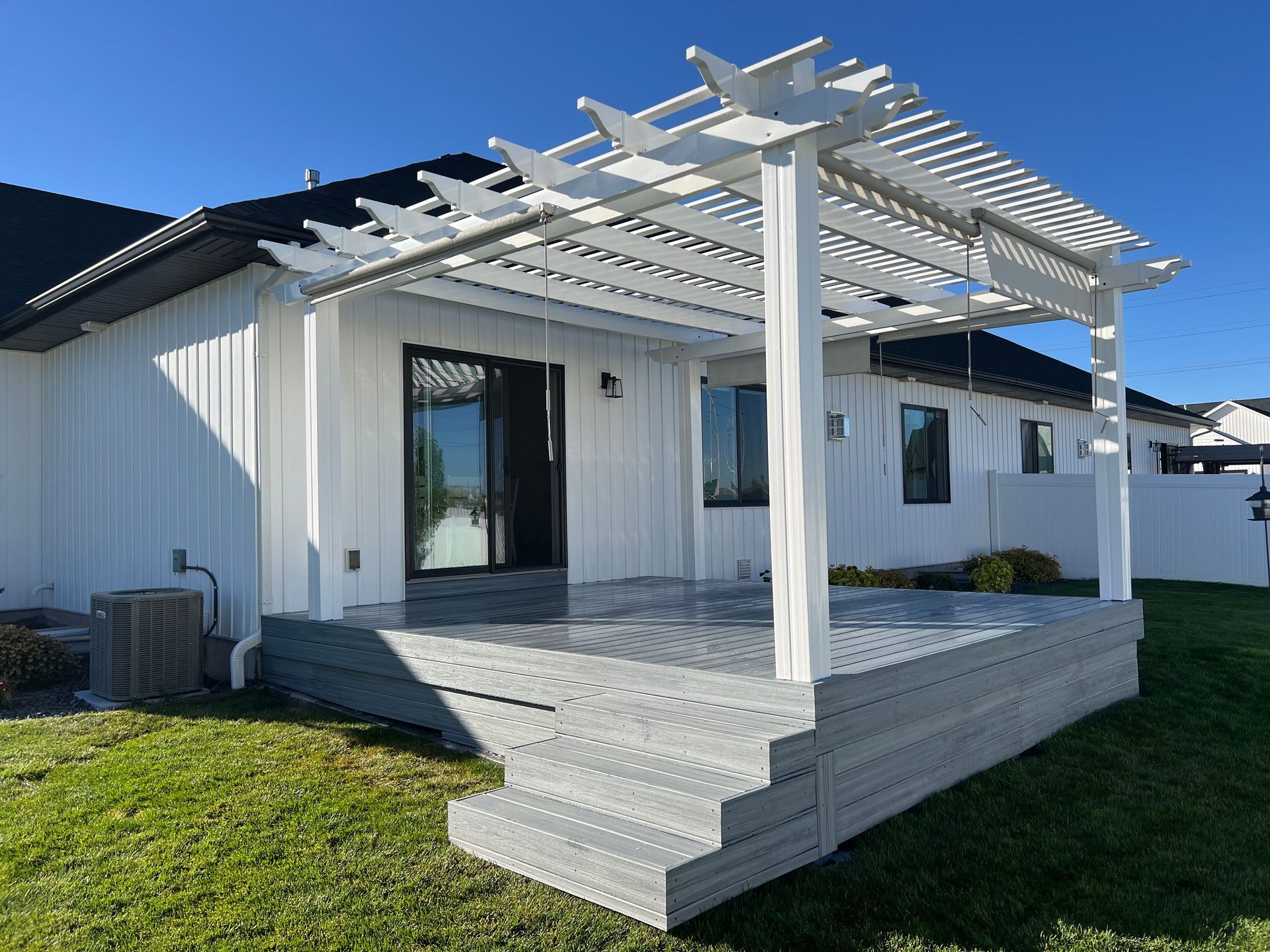 Image of a deck with an integrated pergola. 