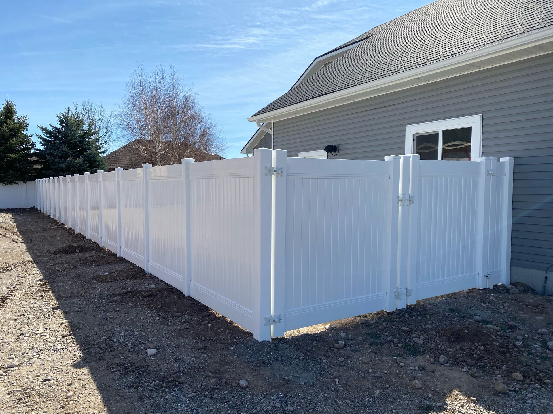 White vinyl fence