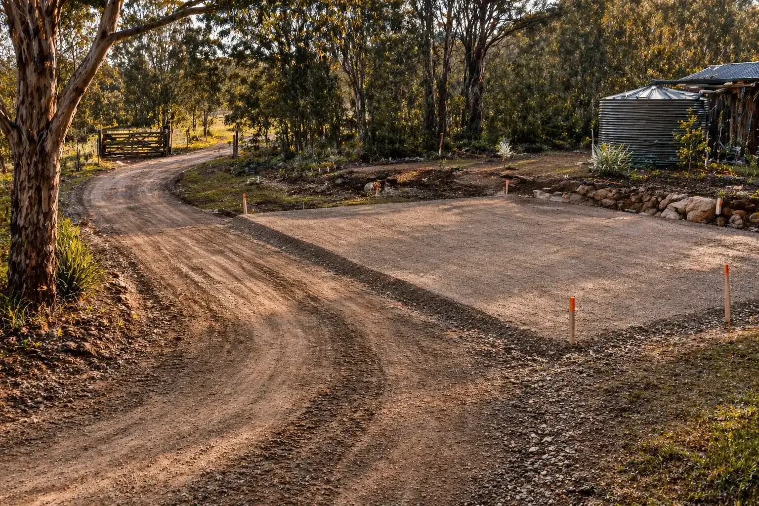 A winding rural access road/driveway and new shed pad in the Lockyer Valley