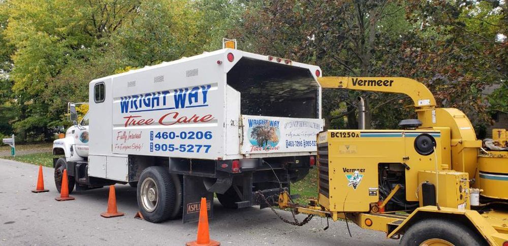 A white truck with the word wright way on it