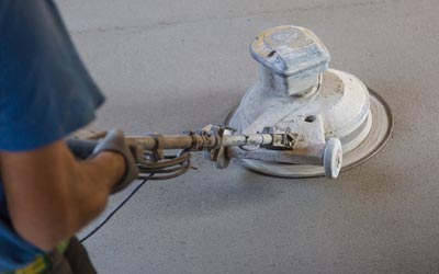 Concrete Polishing — Laborer Polishing Cement Floor in Jacksonville, FL