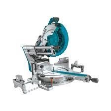 A toolbox filled with tools and gloves on a wooden table.