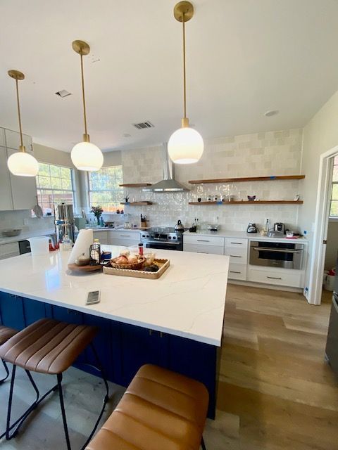 Home in the northwest Austin Lakeline neighborhood that had their full kitchen remodel including new kitchen cabinets, new countertops and new backsplash completed by Austin Painting and Cabinets