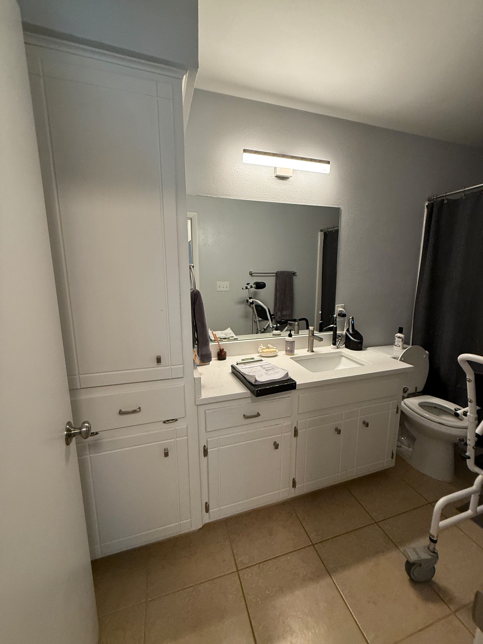Austin bathroom cabinet refacing before photo in Bouldin Creek