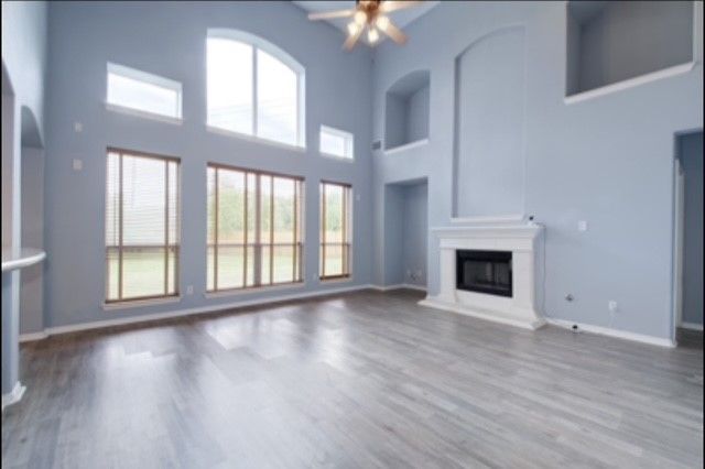 Before interior painting Leander TX showing darker walls ceilings and trim before repainting