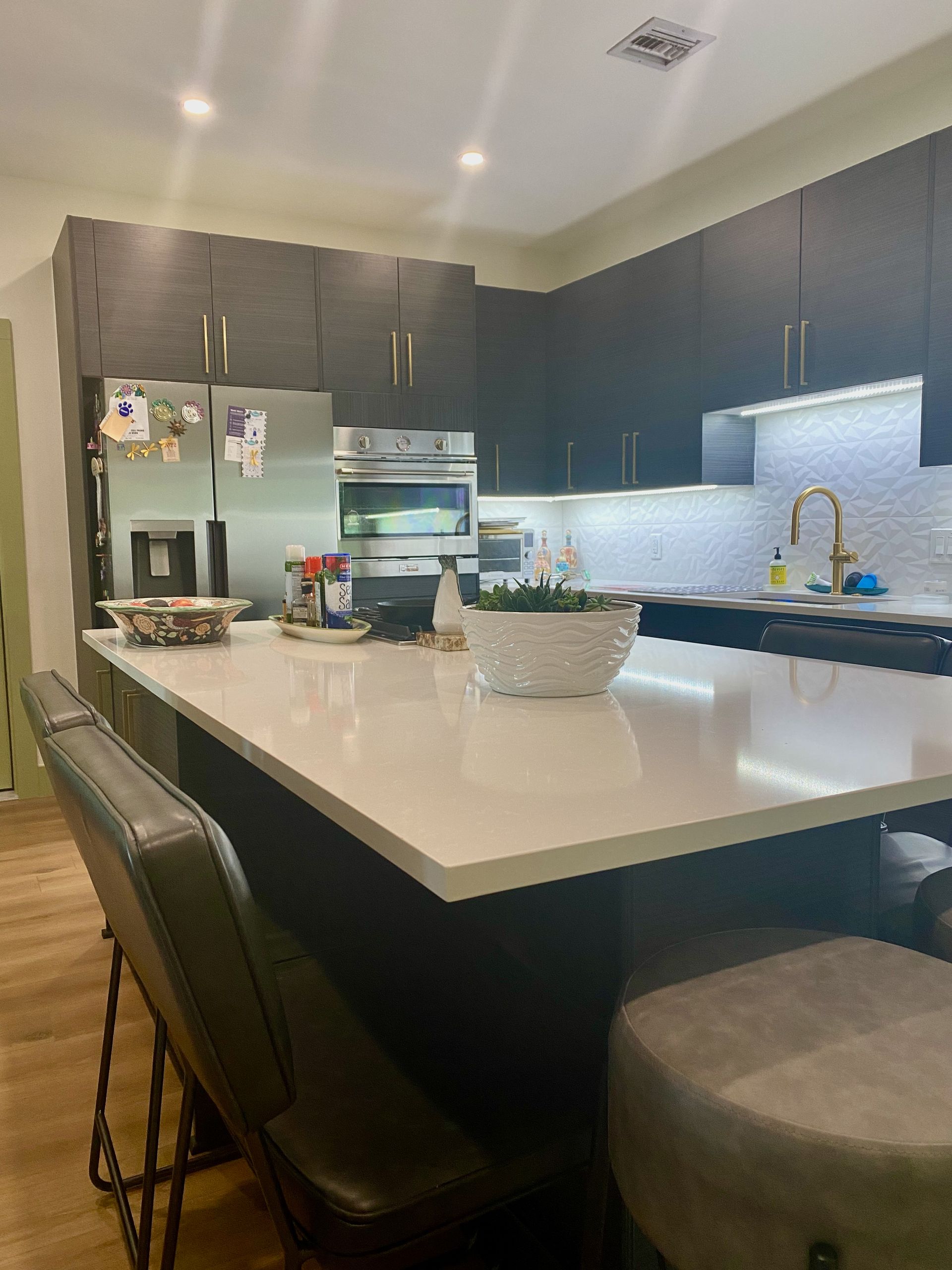 After photo of West Lake Hills kitchen remodel with frameless cabinets quartz countertops backsplash