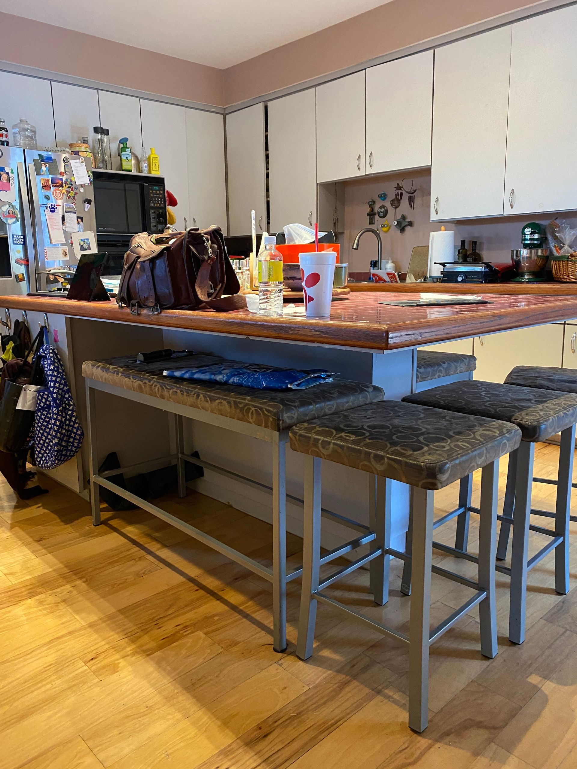 Before photo of West Lake Hills kitchen remodel with older cabinets and outdated finishes