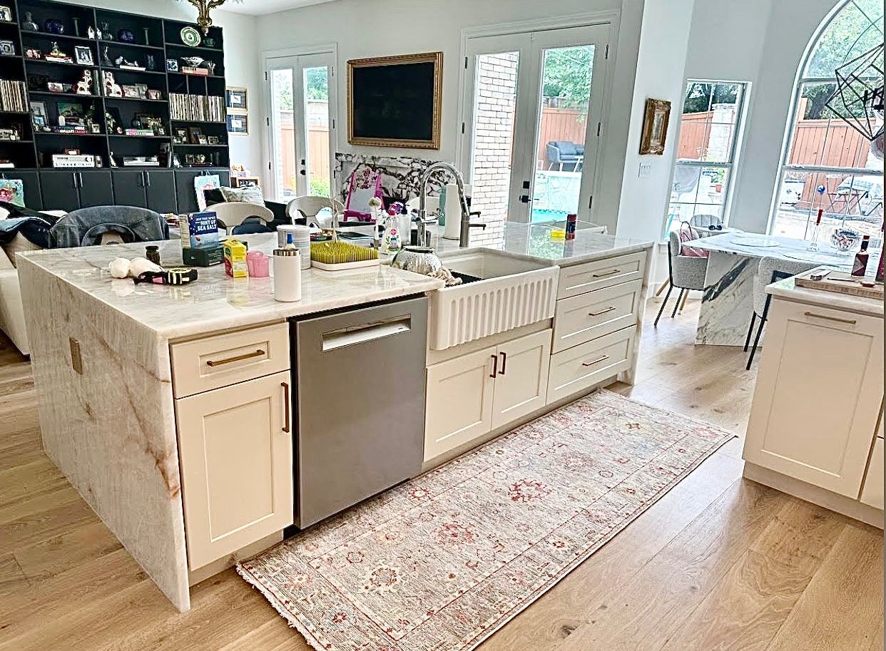 River Place Austin kitchen remodel with custom color shaker cabinets quartzite countertops and open