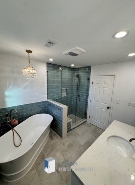 bathroom remodel in cedar park with walk in shower and freestanding tub