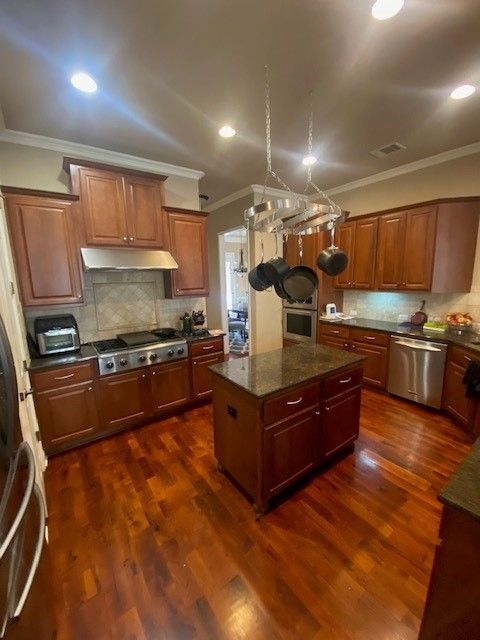 before cedar park kitchen remodel dark cabinets outdated layout