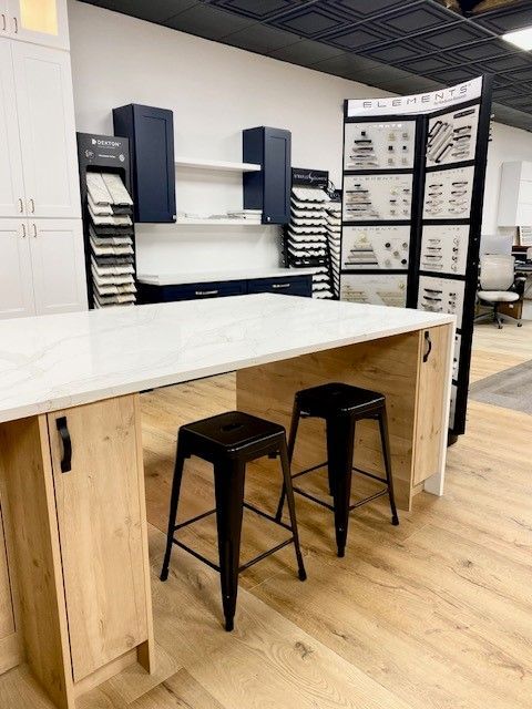 Showroom for Austin Painting and Cabinets in Austin TX displaying their kitchen cabients, new countertops, and new backsplash