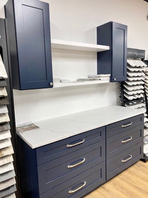Showroom for Austin Painting and Cabinets in Austin TX displaying their kitchen cabients, new countertops, and new backsplash