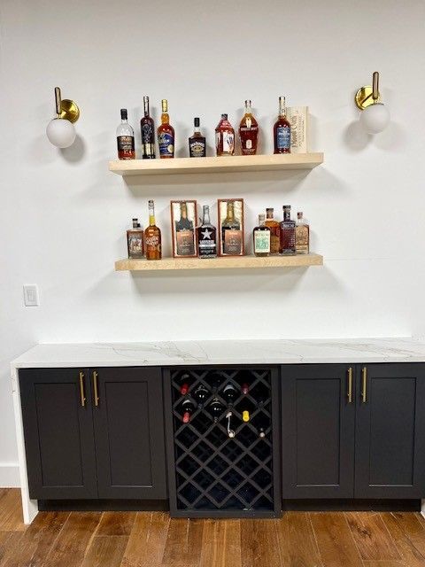 Showroom for Austin Painting and Cabinets in Austin TX displaying their kitchen cabients, new countertops, and new backsplash