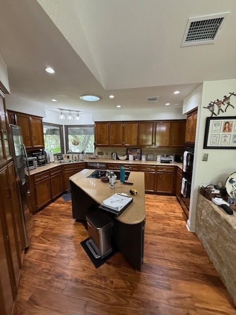 Before photo of Northwest Hills Austin kitchen remodel with furdown and closed layout