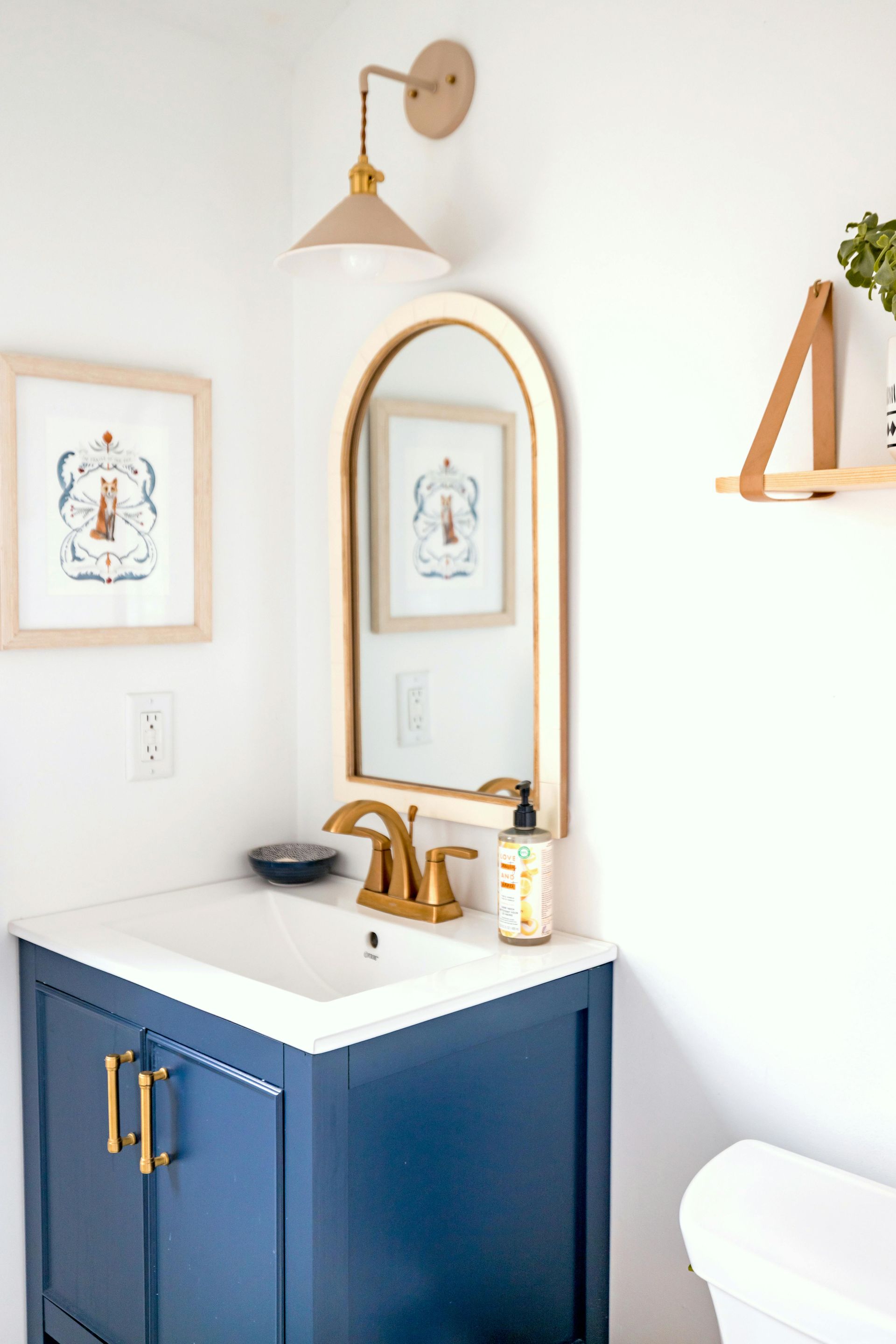 Home bathroom refresh in Manor, TX with powder bath and vanity update