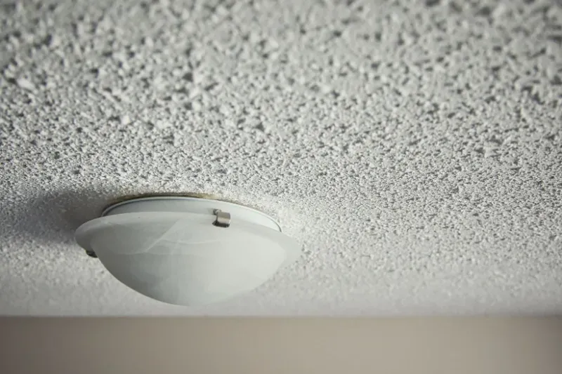 Home in Bee Cave, TX that is about to have their popcorn ceiling removal completed by Austin Painting and Cabinets