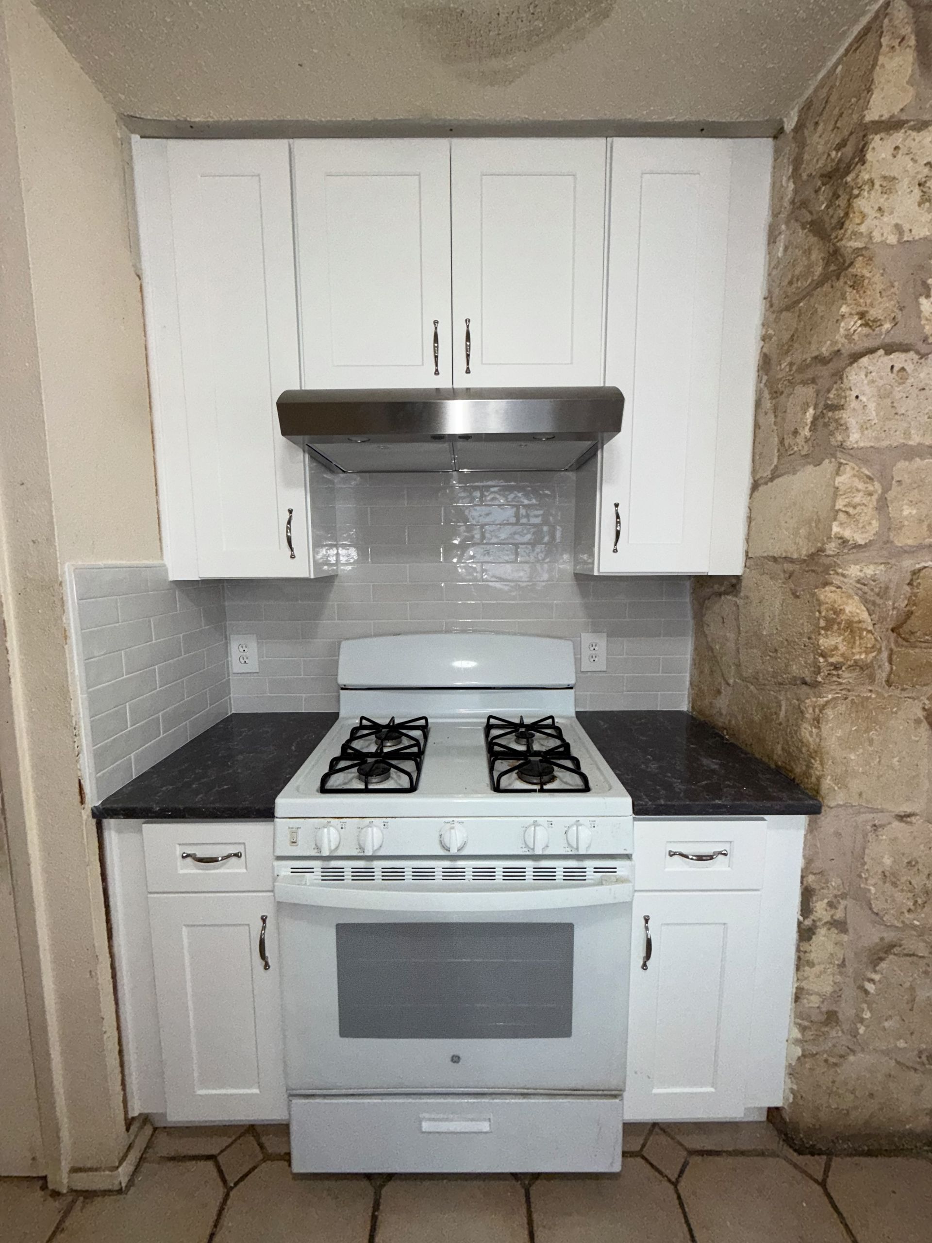 Before picture of South Austin Kitchen Remodel with New cabinets, countertops and backsplash