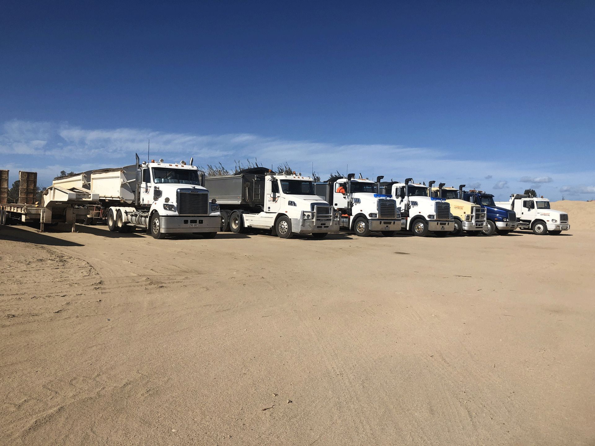 Service Trucks Linedup - Excavation in Bowen, QLD