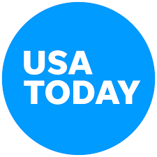A blue circle that says usa today in white letters