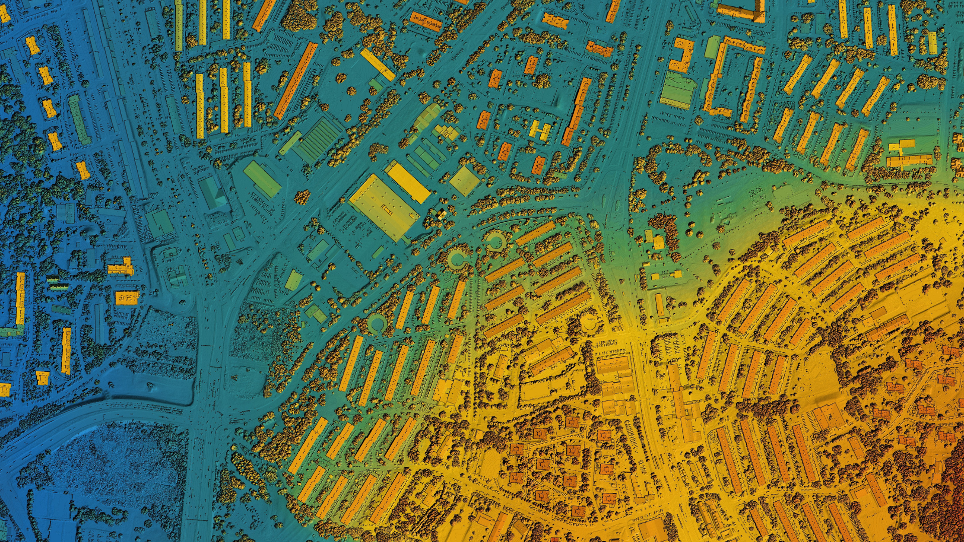 An aerial view of a city with a lot of buildings and roads.